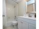 Bright bathroom featuring a shower-tub combo, toilet, and vanity with chrome fixtures at 3745 Almeria Ave # 7S, Sarasota, FL 34239