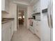 Well-equipped kitchen with modern appliances and ample storage space at 3745 Almeria Ave # 7S, Sarasota, FL 34239