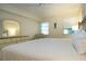 Serene main bedroom featuring a comfortable bed and soft lighting at 3745 Almeria Ave # 7S, Sarasota, FL 34239