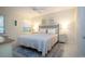 Comfortable main bedroom with cozy bedding and ample natural light at 3745 Almeria Ave # 7S, Sarasota, FL 34239