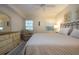 Comfortable bedroom featuring a dresser, chair, and calming neutral tones at 3745 Almeria Ave # 7S, Sarasota, FL 34239