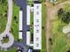Bird's eye view of the condo and parking, green grass and golf course at 3820 Ironwood Ln # 104-I, Bradenton, FL 34209