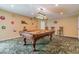 Spacious game room with a pool table, accent lighting, and fun decor on the walls at 3820 Ironwood Ln # 104-I, Bradenton, FL 34209