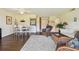 Comfortable living room with open access to the kitchen, dining area, and a bright, inviting atmosphere at 3820 Ironwood Ln # 104-I, Bradenton, FL 34209