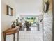 A welcoming living room with view of the green space and patio at 3820 Ironwood Ln # 104-I, Bradenton, FL 34209