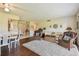 Spacious open floor plan with hardwood floors, plush seating, and lots of natural light at 3820 Ironwood Ln # 104-I, Bradenton, FL 34209