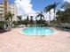 Beautiful community pool area with plenty of lounge chairs for relaxing in the sun at 3820 Ironwood Ln # 104-I, Bradenton, FL 34209