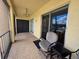 Balcony with seating and open views of the landscape at 3917 Lake Bayshore Dr # F-307, Bradenton, FL 34205