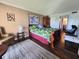 Bedroom with hardwood floors, walk-in closet, and adjacent bathroom at 3917 Lake Bayshore Dr # F-307, Bradenton, FL 34205
