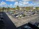 Spacious parking lot with ample parking spaces and palm tree landscaping for residents and visitors at 3917 Lake Bayshore Dr # F-307, Bradenton, FL 34205