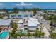 Aerial view of a home showcasing a sparkling pool and neighborhood at 401 39Th St, Holmes Beach, FL 34217