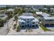 Aerial view of a spacious home with a luxurious design and well-kept landscaping at 401 39Th St, Holmes Beach, FL 34217