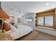 Bright bedroom boasts hardwood floors, recessed lighting, and a built-in window seat at 401 39Th St, Holmes Beach, FL 34217