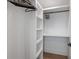 Bright walk-in closet with built-in shelving and ample storage space at 401 39Th St, Holmes Beach, FL 34217