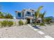 Beautiful two-story home with landscaped front yard and a charming balcony at 401 39Th St, Holmes Beach, FL 34217