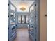 A view into the laundry room with a front load washer/dryer at 401 39Th St, Holmes Beach, FL 34217