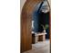 An office featuring dark blue walls, wood desk, and natural light at 401 39Th St, Holmes Beach, FL 34217