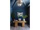 An office with blue walls, decor, wooden desk, and a modern chandelier at 401 39Th St, Holmes Beach, FL 34217