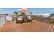 Relaxing rooftop deck with comfortable seating and picturesque views at 401 39Th St, Holmes Beach, FL 34217