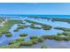 Stunning aerial view of the intercoastal waterway with green islands at 401 N Point Rd # 504, Osprey, FL 34229