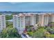 Luxury high-rise condos with lush landscaping offer stunning views of the surrounding area and ocean at 401 N Point Rd # 504, Osprey, FL 34229