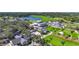 Golf course clubhouse and surrounding golf course view with lush fairways and meticulously manicured green lawns at 401 N Point Rd # 504, Osprey, FL 34229
