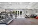 Well-equipped fitness center with treadmills, weights, and ample space for a complete workout at 401 N Point Rd # 504, Osprey, FL 34229