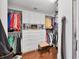 Spacious walk-in closet boasts custom shelving, drawers, and ample storage space for clothing and accessories at 401 N Point Rd # 504, Osprey, FL 34229