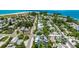 Aerial view of homes, showcasing the proximity to the ocean at 421 Alamanda Rd, Anna Maria, FL 34216