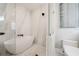 Luxurious bathroom featuring a standalone tub, glass-enclosed shower, and elegant finishes at 421 Alamanda Rd, Anna Maria, FL 34216
