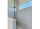 Shower stall boasts gray tiling, a glass partition, and a window to let in natural light at 4210 Sea Marsh Pl, Parrish, FL 34219