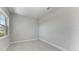 This empty bedroom is freshly painted with neutral colors and features tile floors at 4210 Sea Marsh Pl, Parrish, FL 34219