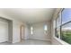 Well-lit bedroom with two windows and tiled flooring at 4210 Sea Marsh Pl, Parrish, FL 34219