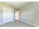 This bedroom has tile floors, neutral paint, and a closet at 4210 Sea Marsh Pl, Parrish, FL 34219