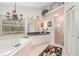 Bright bathroom with a soaking tub, a glass-enclosed shower, and updated fixtures at 4374 Indian Point Trl, Sarasota, FL 34238