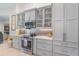 Beautiful kitchen features updated appliances, custom cabinets and tiled backsplash at 4374 Indian Point Trl, Sarasota, FL 34238