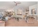Spacious open-concept living area features comfortable seating, kitchen, and dining areas at 4374 Indian Point Trl, Sarasota, FL 34238