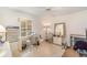 Bright home office featuring a sewing desk, a large window, and exercise equipment at 4374 Indian Point Trl, Sarasota, FL 34238