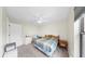 Cozy bedroom with ceiling fan, neutral walls, and a full-sized bed at 4637 31St E Ct, Bradenton, FL 34203