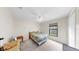 Standard bedroom with ceiling fan, neutral walls, and a full-sized bed with window at 4637 31St E Ct, Bradenton, FL 34203