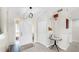 Inviting foyer with a front door, closet, and light gray tile flooring at 4637 31St E Ct, Bradenton, FL 34203