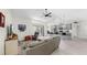 Comfortable living room featuring an open floor plan with a view of the kitchen and pool at 4637 31St E Ct, Bradenton, FL 34203