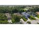 A charming single-Gathering home features a private screened pool, solar panels, and a beautifully landscaped yard at 5044 Creekside Trl, Sarasota, FL 34243