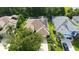 A charming single-Gathering home features a private screened pool, solar panels, and a beautifully landscaped yard at 5044 Creekside Trl, Sarasota, FL 34243