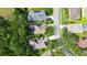 A charming single-Gathering home features a private screened pool, solar panels, and a beautifully landscaped yard at 5044 Creekside Trl, Sarasota, FL 34243