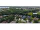 A charming single-Gathering home features a private screened pool, solar panels, and a beautifully landscaped yard at 5044 Creekside Trl, Sarasota, FL 34243