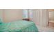 Bedroom with window and closet at 5044 Creekside Trl, Sarasota, FL 34243