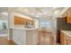 Bright eat-in kitchen with breakfast nook features stainless steel appliances and ample cabinets at 5044 Creekside Trl, Sarasota, FL 34243