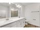 Modern bathroom featuring double sink vanity, ample counter space, and bright lighting at 5213 Patano Loop, Palmetto, FL 34221