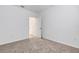 Empty bedroom with neutral carpet and window at 5213 Patano Loop, Palmetto, FL 34221